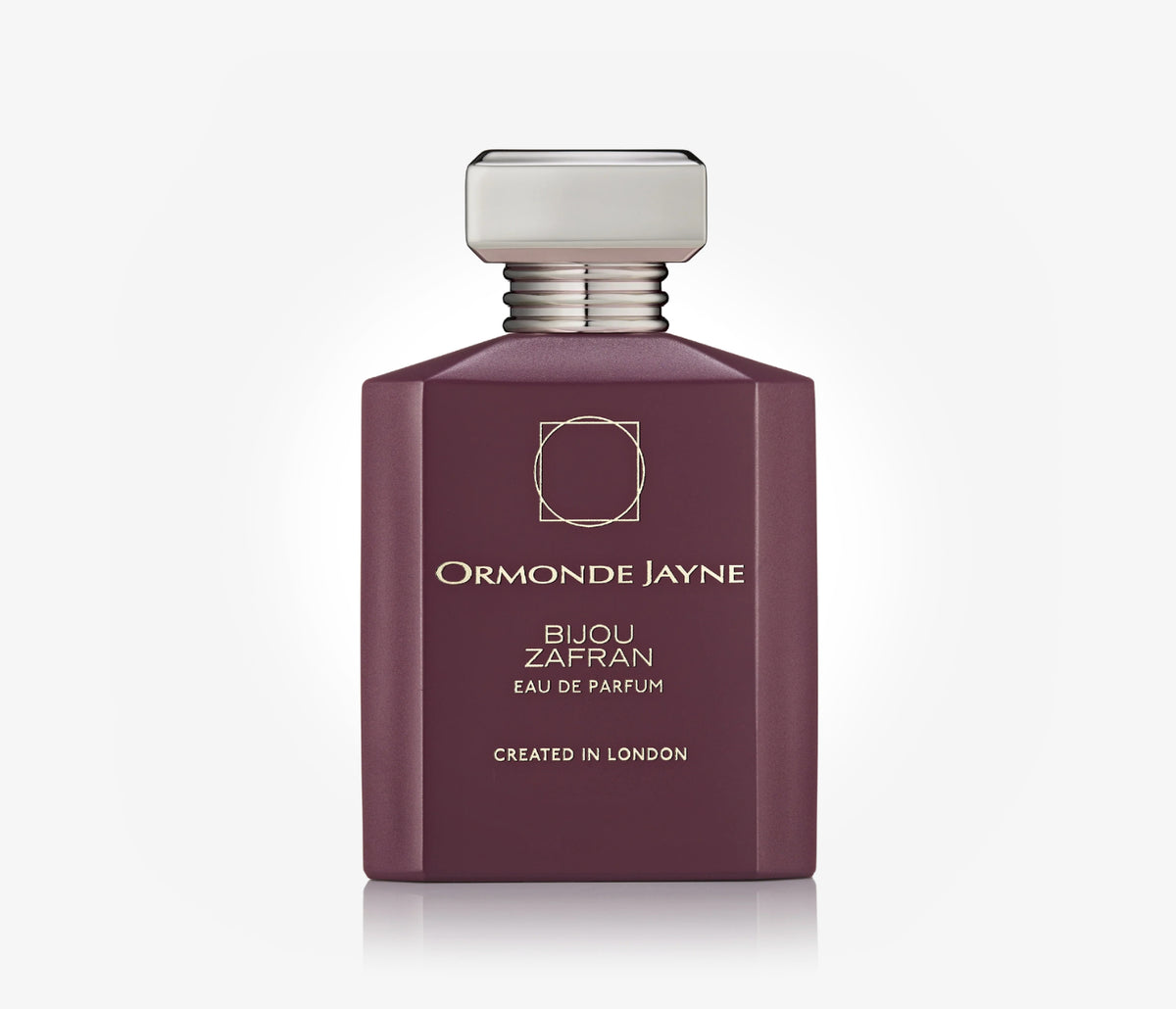 A bottle of niche perfume Bijou Zafran by Ormonde Jayne on a pale grey blackground.