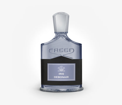 Creed Iris Debonair Eau de Toilette niche perfume bottle on a pale grey background.