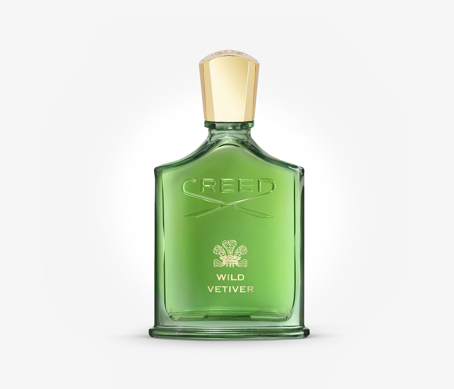 A bottle of Creed Wild Vetiver luxury niche perfume on a pale grey background.