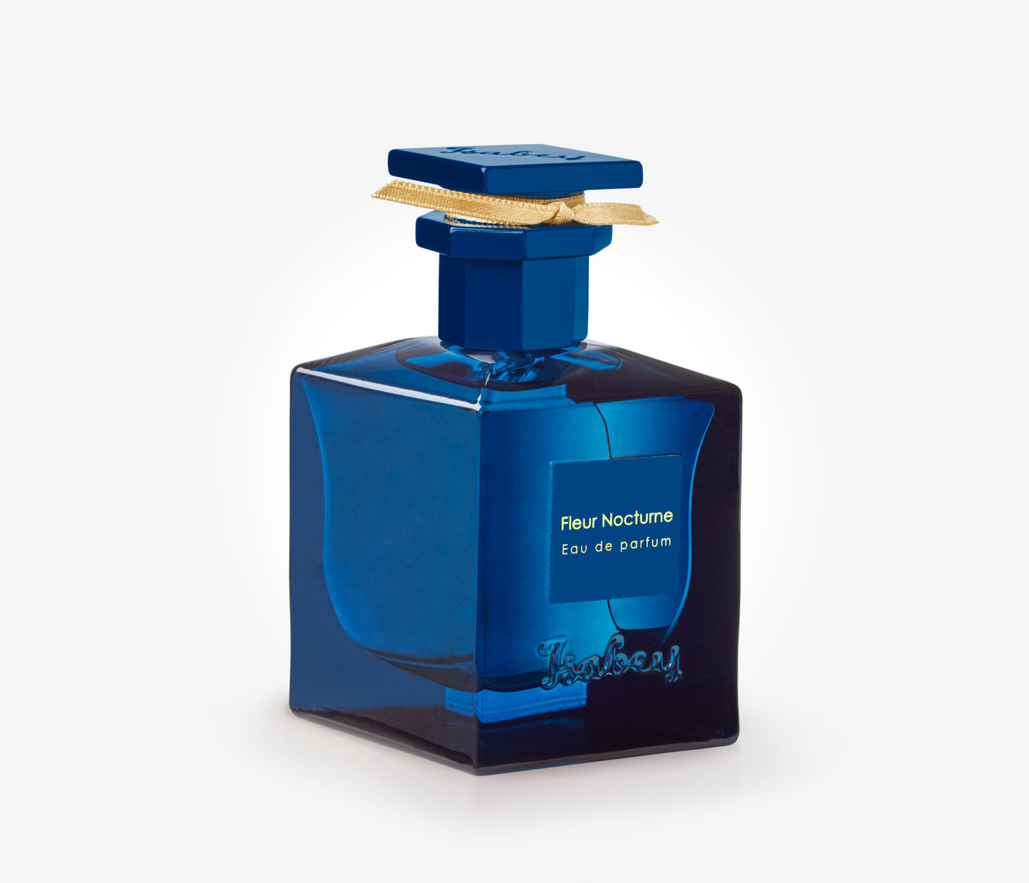 A bottle of Isabey Fleur Nocturne exclusive luxury perfume on a pale grey backgound.