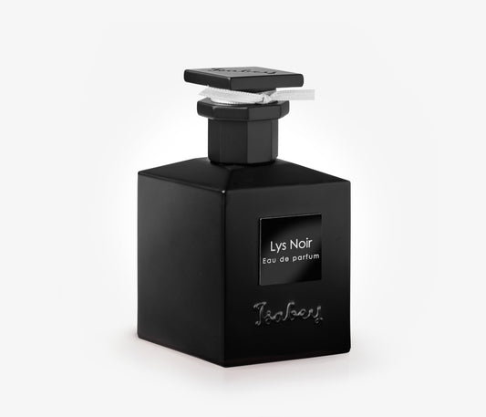 A bottle of Isabey Lys Noir exclusive luxury perfume on a pale grey backgound.