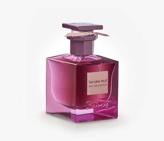 A bottle of Isabey Tendre Nuit exclusive luxury perfume on a pale grey backgound.