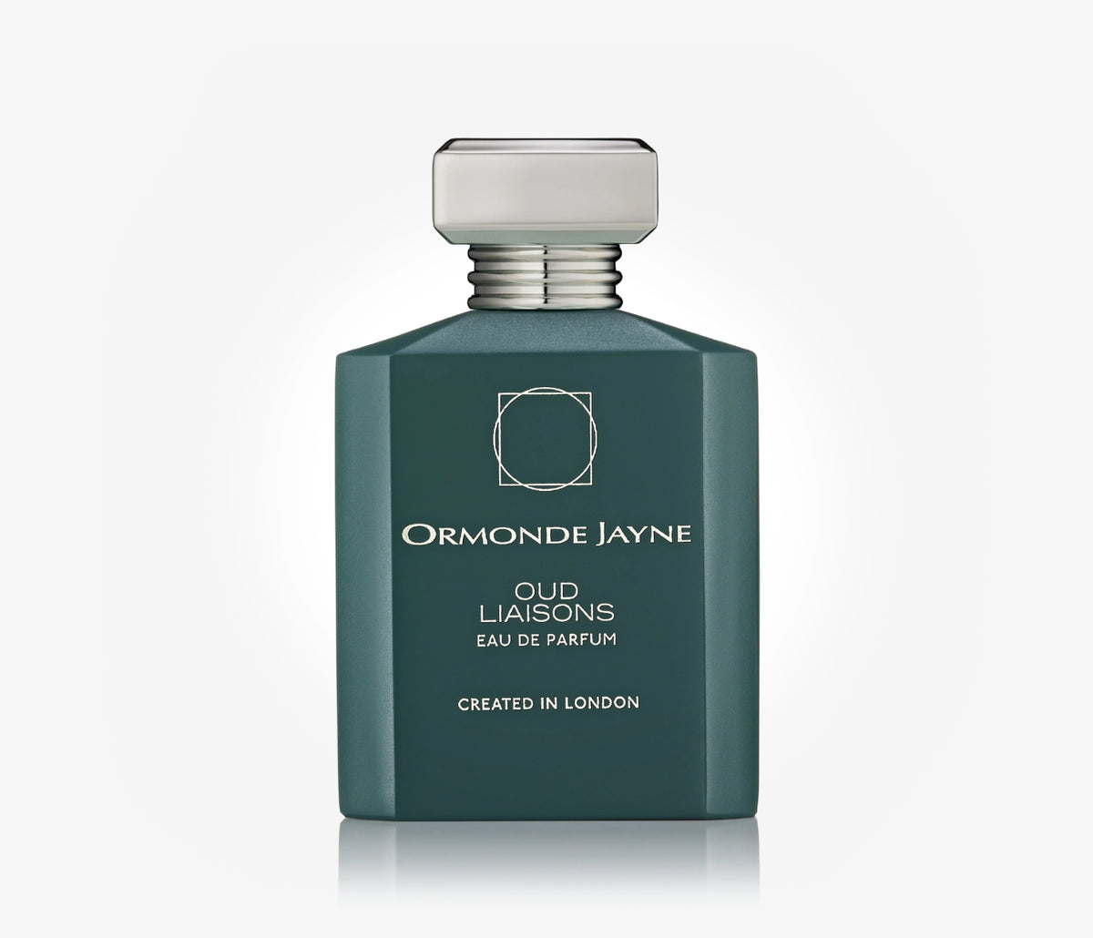 A bottle of niche perfume Oud Liaisons by Ormonde Jayne on a pale grey background.