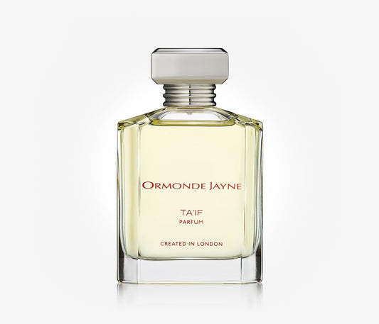 A bottle of the niche perfume Ta'if by Ormonde Jayne on a pale grey background.