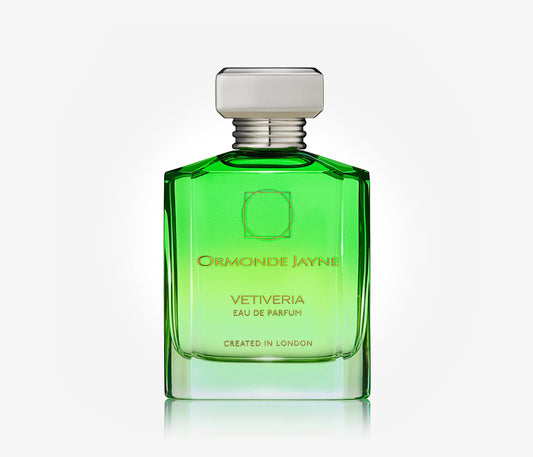 A bottle of niche perfume Vetiveria by Ormonde Jayne on a pale grey background.